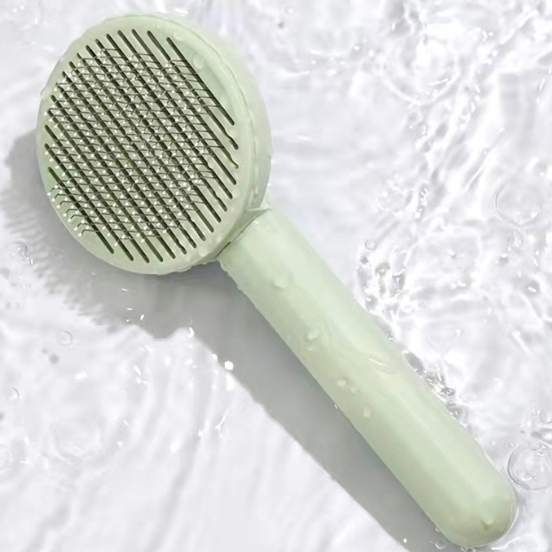 The Doodle De-Tangler™ Self-Cleaning Slicker Brush