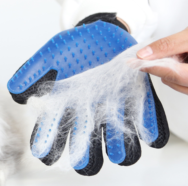 Pet grooming gloves available in pink and blue